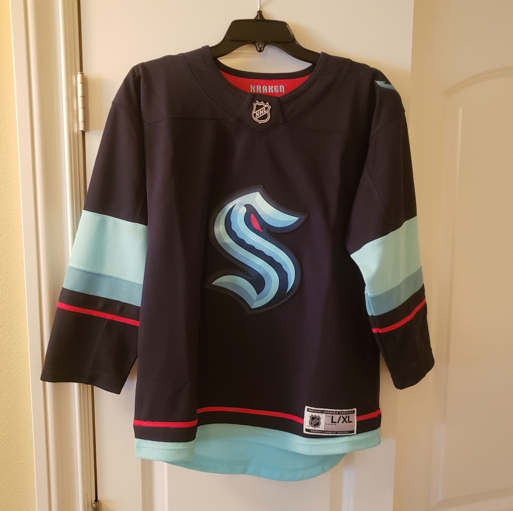Brand new Seattle Kraken youth L/XL jersey.